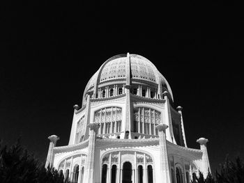 Low angle view of building against sky at night