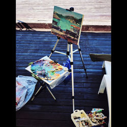 Chairs and table against sea