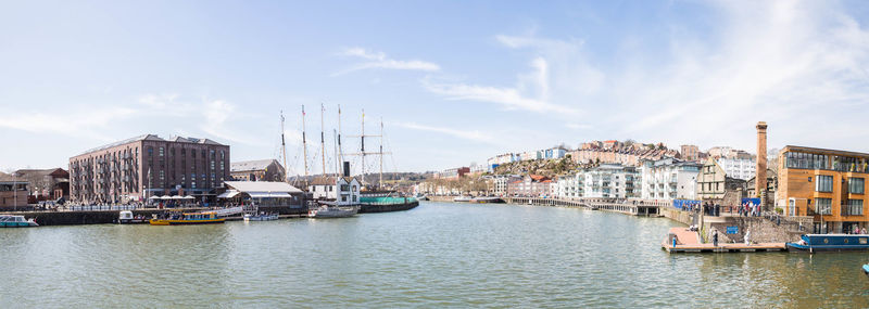 Boats moored at harbor