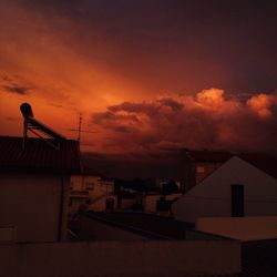 Low angle view of cloudy sky at sunset