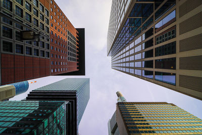 Low angle view of modern buildings in city