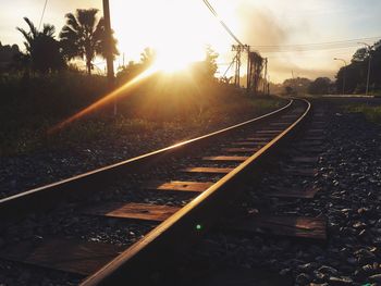 View of railway tracks at sunset
