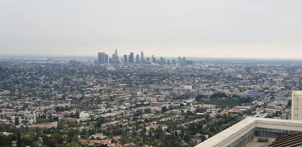 High angle view of buildings against sky in city