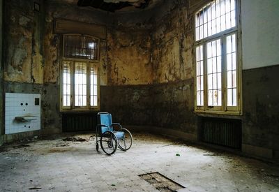 Wheelchair in abandoned building