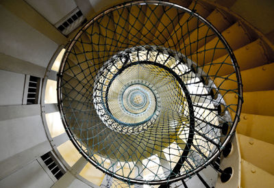 Low angle view of spiral staircase in building