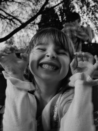 Close-up of playful girl at park