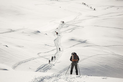 Man skiing on snowcapped mountain