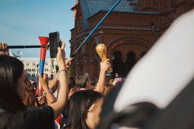 People celebrating in city