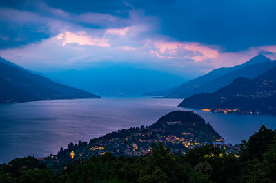 Lake como, the hill of bellagio, and the villages overlooking the lake, with the storm, at dusk.