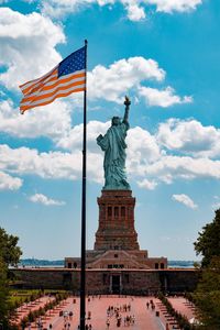 Freedom - statue of liberty with windy usa flag