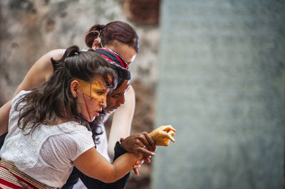 Close-up of person holding stick