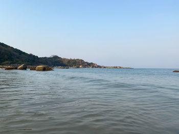 Scenic view of sea against clear sky