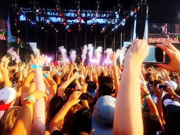 People enjoying at concert