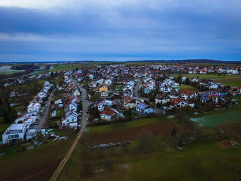 High angle shot of townscape against sky