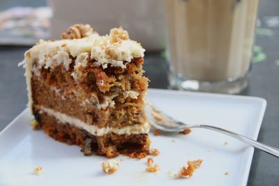 Close-up of carrot cake in plate on table