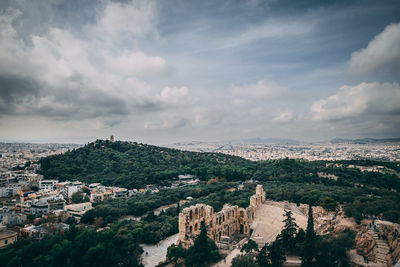 High angle view of townscape against cloudy sky