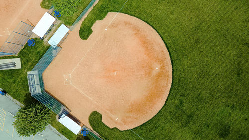 Fresh grass grows in the spring around the baseball fields at a local park.