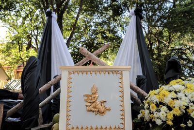 Panoramic view of cross on temple against sky
