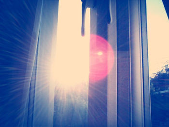 Sun shining through clouds