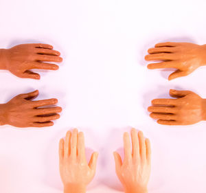 Cropped image of people with hands