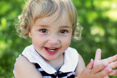 Portrait of cute baby boy smiling