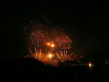 Firework display at night