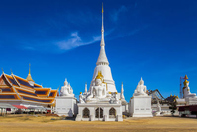 View of temple building against blue sky