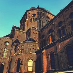 Low angle view of ornate building against sky