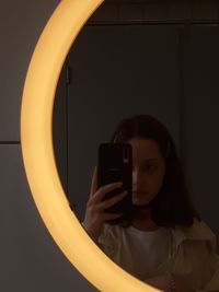 Portrait of man photographing camera