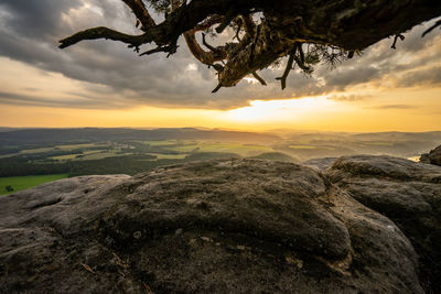 Scenic view of landscape against sky during sunset