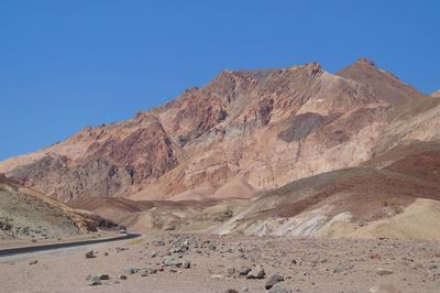 Scenic view of desert against clear blue sky, artists palette, death valley 