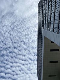 Low angle view of modern building against sky