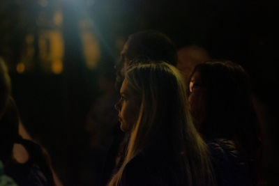 Group of people looking at music concert