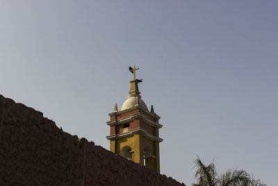 Low angle view of statue against sky