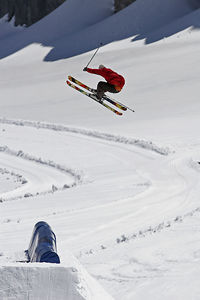 Person skiing on snowcapped mountain