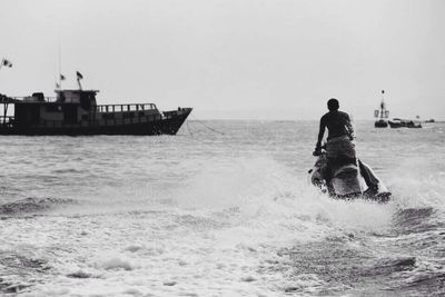 People on boat in sea