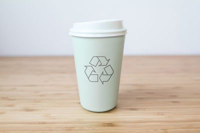 Close-up of coffee cup on table