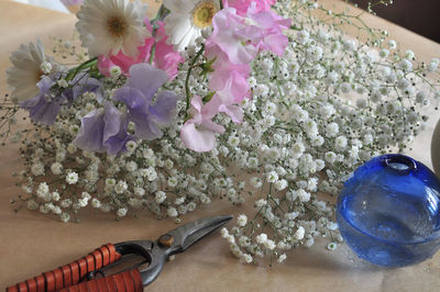 High angle view of pink roses on table