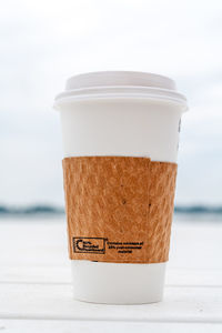 Close-up of coffee cup on table