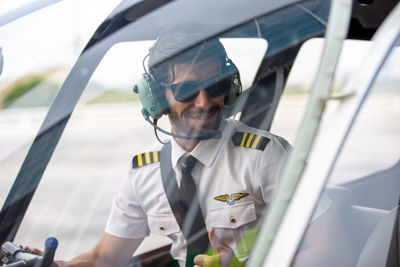 Close-up of pilot siting at cockpit