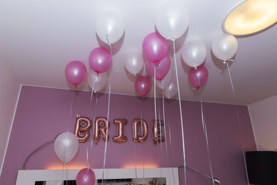 Low angle view of balloons hanging on ceiling