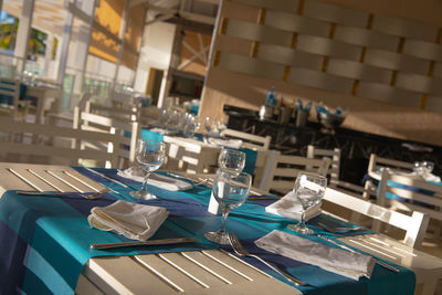 Close-up of empty bottles on table in restaurant