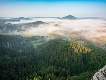 Valley of bohemian switzerland, hills with fog, beautiful national park ceske svycarsko, czechia