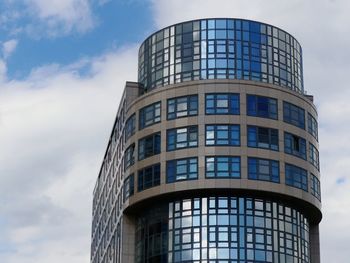 Low angle view of modern building against sky