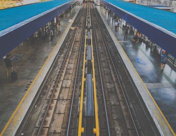 High angle view of people on railroad station platform