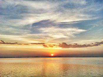 Scenic view of sea at sunset