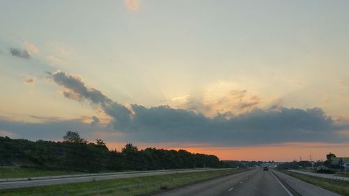 Road passing through field