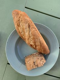 High angle view of white bred served on table