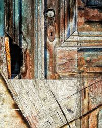 Full frame shot of weathered wooden door