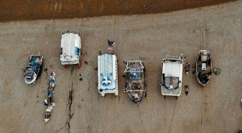 High angle view of boats on sand at beach